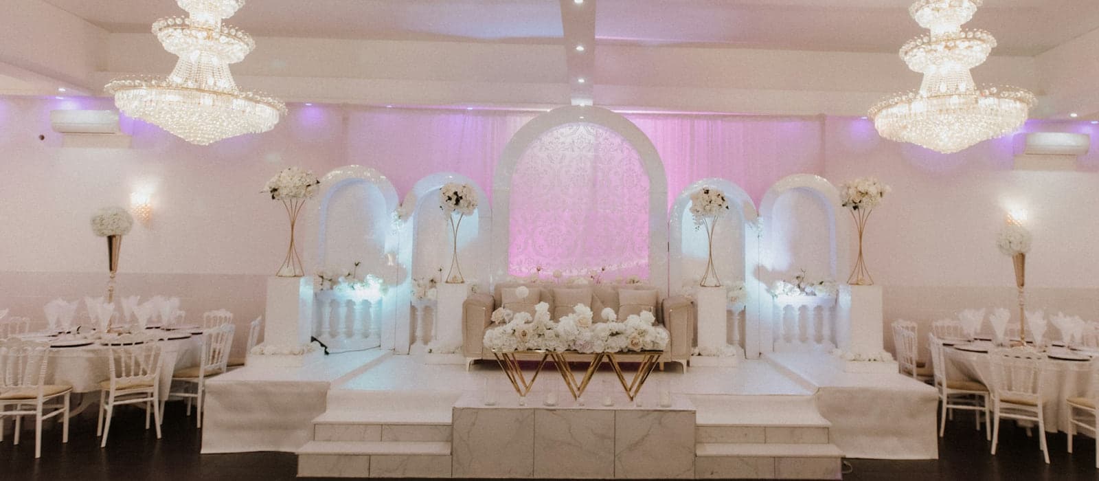 A function room set for an event, the kind of venue that runs a partition several times a week
